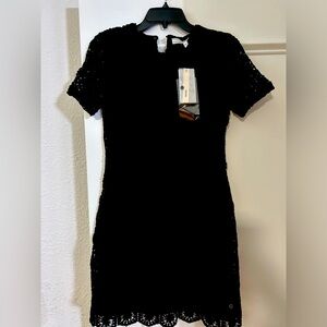 Black Guess dress with crochet overlay. Modern and tasteful.
